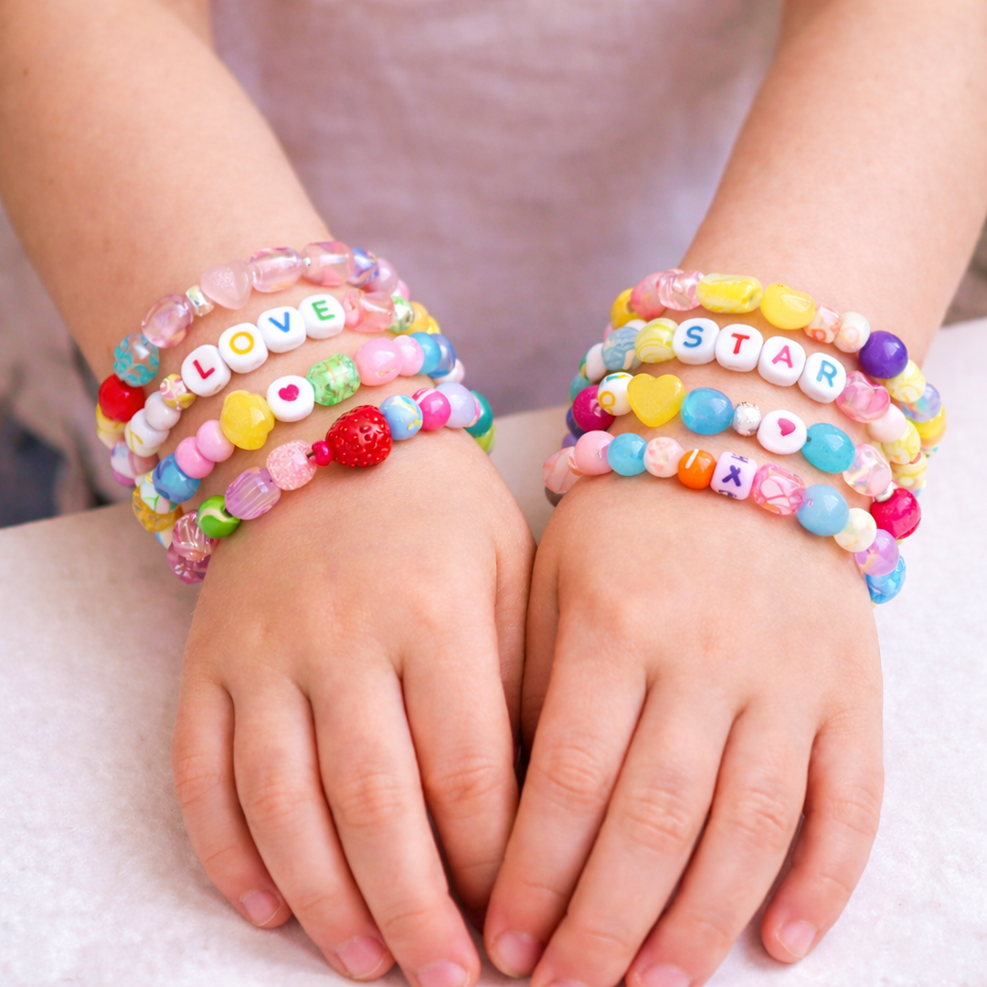 Unicorn Bracelet Kit 1410 pcs for kids ages 6–10 – massive DIY jewelry making set with beads, charms, and strings for creating personalized bracelets and accessories. Encourages creativity, patience, fine motor skills, and screen-free artistic expression with safe non-toxic materials and unicorn storage organizer.
